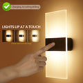 Smart motion-activated wall light by cj with built-in dual USB ports, ideal for bedroom, hallway, or kitchen lighting.