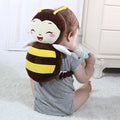 Cute baby head protection pillow with angel wing design, toddler safety pad, ideal for kids' head and neck support.