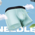 Men's seamless underwear by CJ, one-piece boxer briefs with ultra-thin fabric and U-shaped convex design, shown in the image.