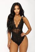 Sexy black lace-up women's one-piece lingerie by CJ, featuring revealing lace details and a fitted, alluring design.