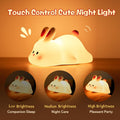 Cute cartoon rabbit night light by CJ, silicone touch sensor lamp for kids, soft glow and adorable bunny design for children's room.