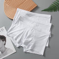 Light-colored men's youth white boxer underwear by CJ, showing the comfortable fit and soft fabric of the boxer briefs.