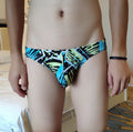 Men's printed trendy briefs by CJ featuring a tight low waist design, showcasing colorful patterned fabric and comfortable fit.
