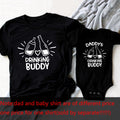 Matching father and son T-shirts by CJ featuring short sleeve crewneck design with fun, coordinated graphics on a white background.