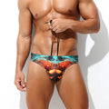 Men's quick-drying digital printing low-waisted shorts in black with colorful geometric patterns, casual and comfortable for summer wear.