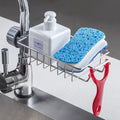 Adjustable cj sink organizer with over-the-faucet drain rack and soap holder, featuring metal and plastic construction for kitchen use.