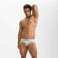 Solid color men's triangle underpants by CJ with thread detail, showcasing comfortable fit and stylish design.