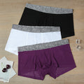 Men's seamless, breathable transparent boxer briefs by CJ featuring lace design and sweat-absorbent, sexy fit.