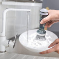CJ pot and dish scrub brush with soap dispenser, ideal for cleaning pots, pans, and kitchen sinks.