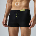Men's minimalist solid color base flat corner shorts in black with clean design and flat corners, by CJ.