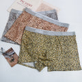 Men's large size loose leopard print underwear from cj, featuring comfortable fit and bold animal pattern, shown on model.