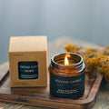 Vintage scented candle from CJ, featuring a warm, decorative candle for home ambiance with intricate design and soft glow.