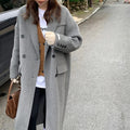 Women's gray woolen loose coat by cj, featuring a plump design suitable for all-match styling.