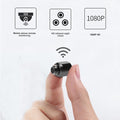 CJ baby monitor with indoor security camera showing a sleek black device with a wide-angle lens and user interface.