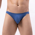 Men's solid color casual triangle pants by CJ, featuring a simple design and comfortable fit, shown in a neutral color.